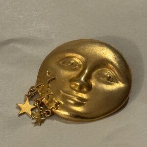 Gold Toned Moon Face Brooch with Star Charms